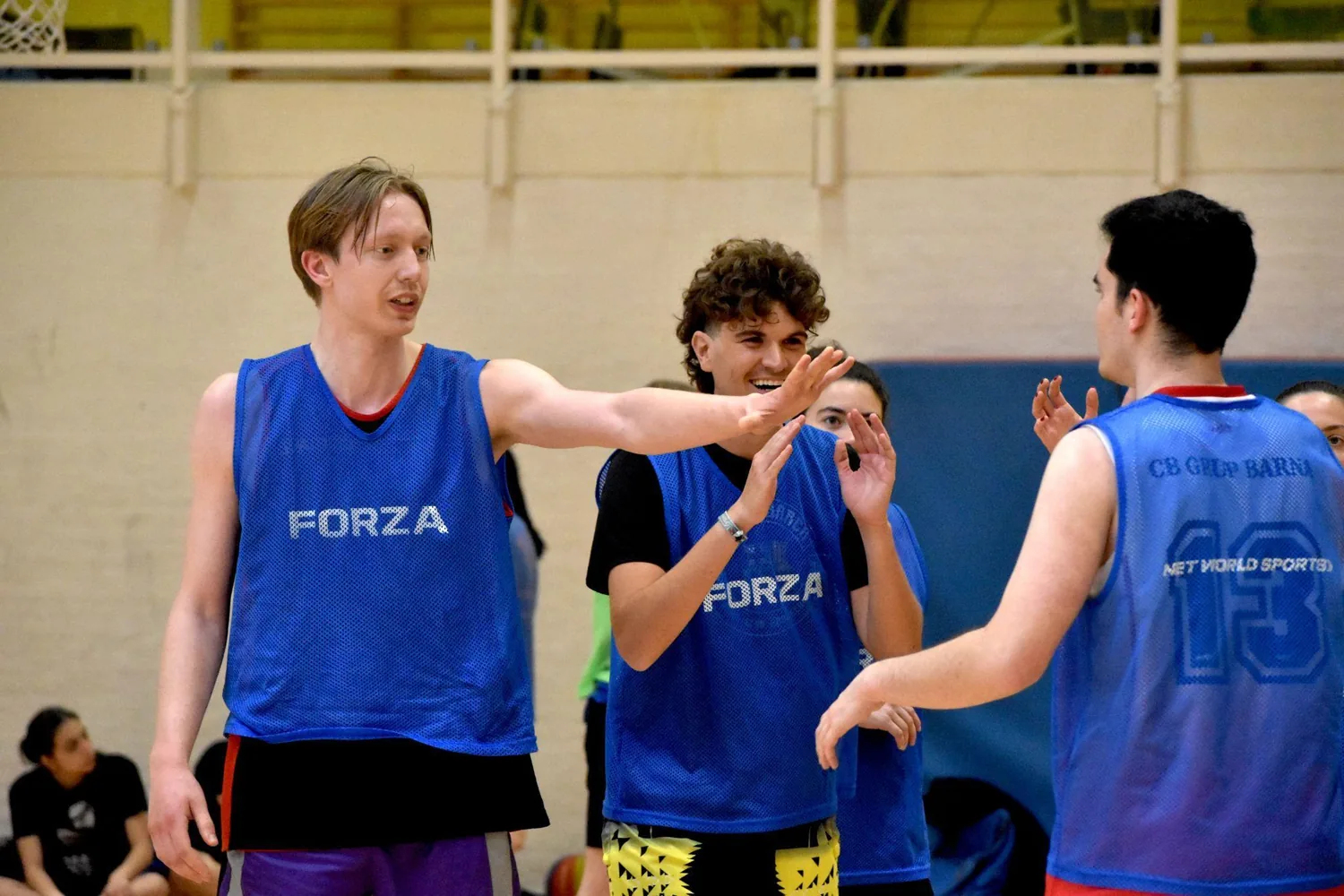 athme community gathered on a court